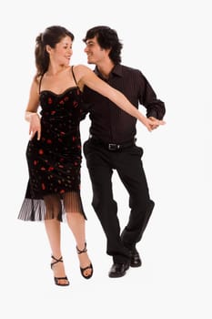Studio portrait of couple dancing