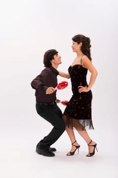 Studio portrait of couple dancing