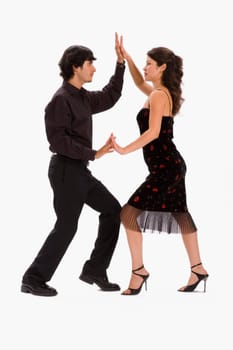 Studio portrait of couple dancing