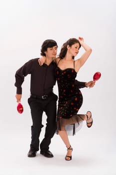 Studio portrait of couple dancing