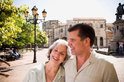 Close-up of a senior woman with her son smiling, Santo Domingo, Dominican Republic
