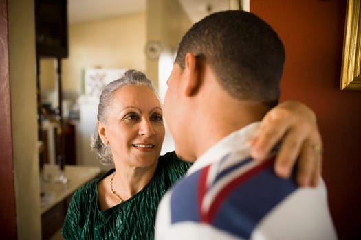Close-up of a mature woman talking to her grandson