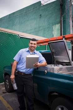 Cable man standing near his truck