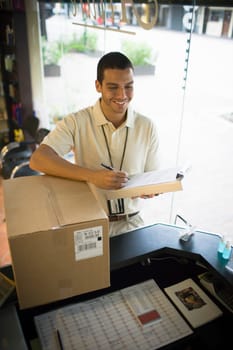 Delivery person making delivery to salon