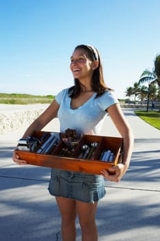 Woman selling cigars at beach