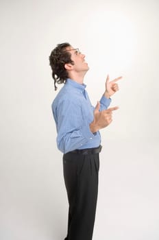 Man wearing crooked glasses gesturing