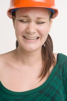 Portrait of young woman wearing hard hat