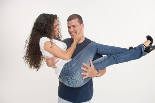 Young man carrying fiancee
