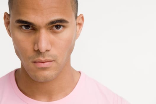 Portrait of young man looking at camera