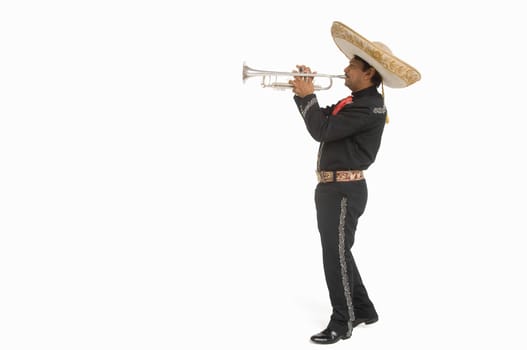 Portrait of Mariachi playing trumpet