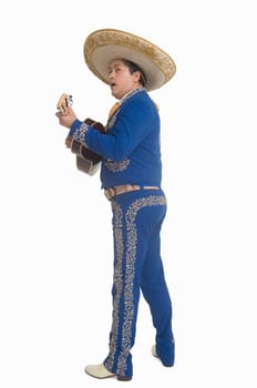 Portrait of Mariachi playing guitar and singing
