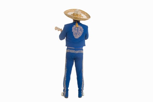 Portrait of Mariachi playing guitar and singing