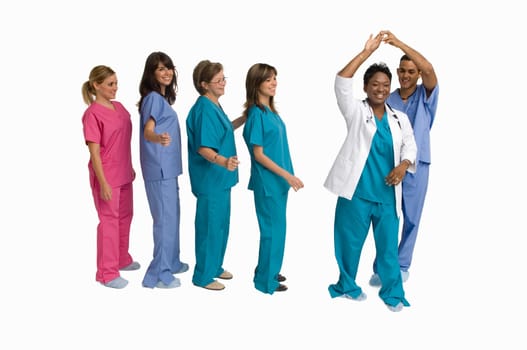 Group portrait of doctors and nurses dancing