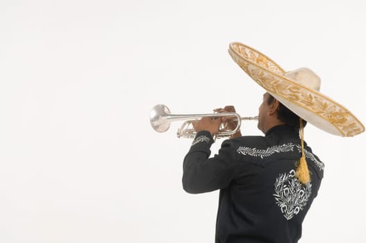 Portrait of Mariachi playing trumpet