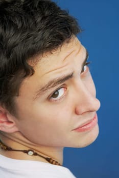 Young man looking back