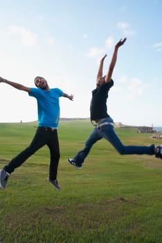 Young men jumping