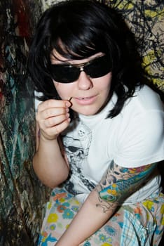Young woman wearing sunglasses