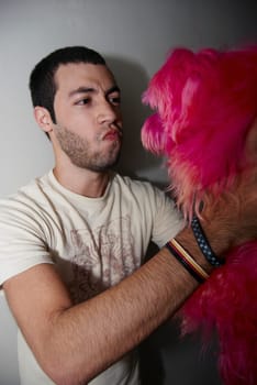 Man with hot pink dog