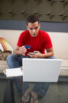 Young man online shopping