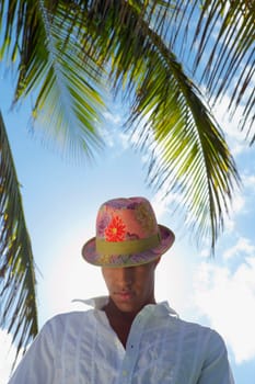 Close-up of a young man wearing a hat