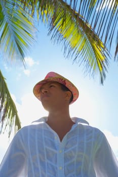 Low angle view of a young man standing