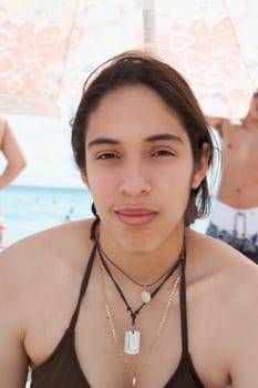 Portrait of a young woman on the beach