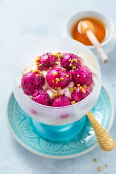 White Greek Yogurt with dragon fruit (Pitaya) and sweet honey
