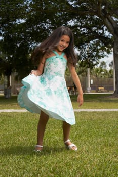 Girl dancing in a park