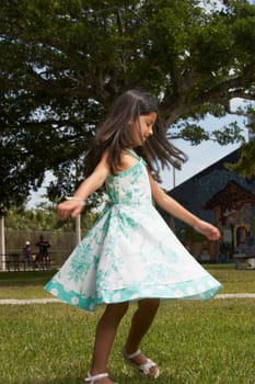 Girl dancing in a park