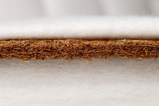 Close-up mattress made of coconut fiber. macro photo with soft focus.