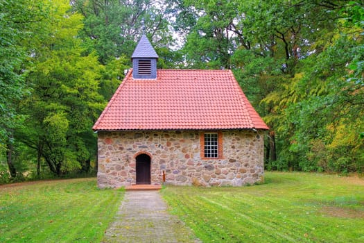 old fieldstone chapel in Muessingen, Lueneburg Heath in Germany