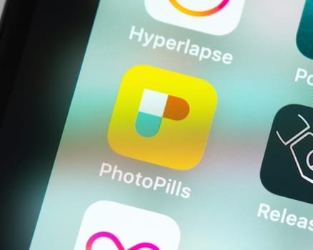 BAYONNE, FRANCE - CIRCA JANUARY 2021: PhotoPills app icon on Apple iPhone screen. PhotoPills is a photography planning app.