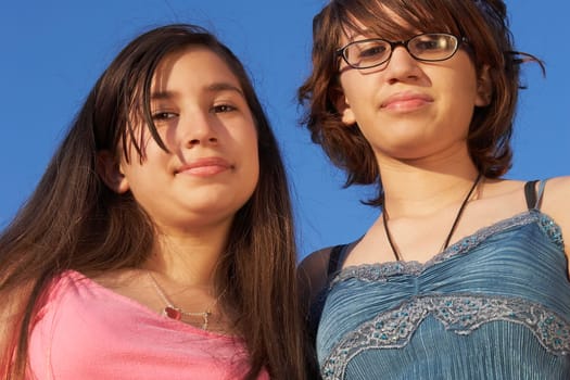 Low angle view of a teenage girl with her sister