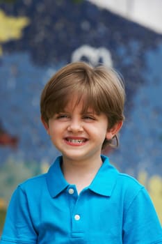 Close-up of a boy clenching his teeth