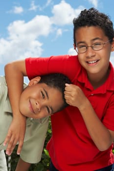 Close-up of a boy pulling the hair of another boy