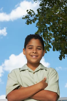 Portrait of a boy with his arms crossed