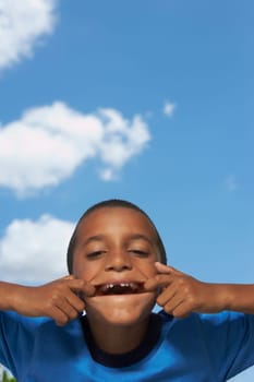 Portrait of a boy making a face