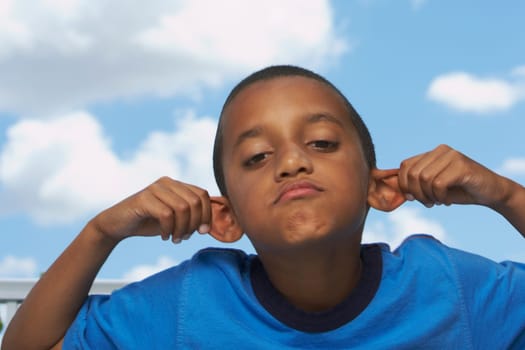 Portrait of a boy making a face