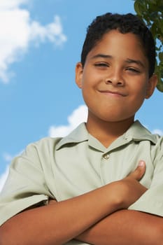 Portrait of a boy with his arms crossed