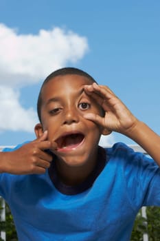 Portrait of a boy making a face