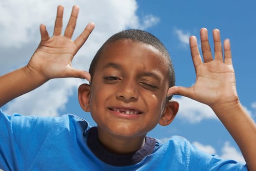 Portrait of a boy making a face
