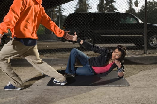 Young couple break dancing