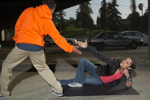Young couple break dancing