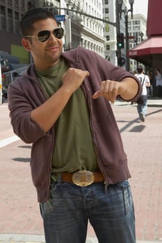 Young man standing on the road