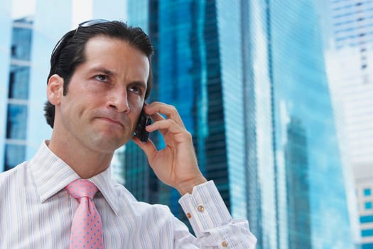 Close-up of a businessman talking on a mobile phone
