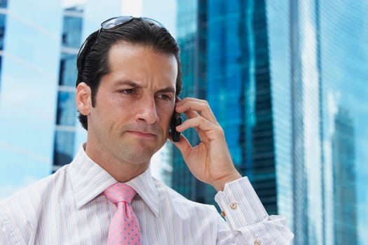 Close-up of a businessman talking on a mobile phone