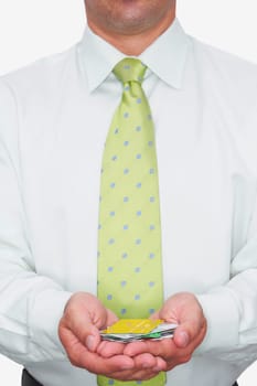 Mid section view of a businessman holding various types of credit cards