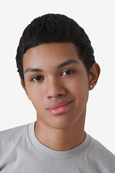 Portrait of a teenage boy smirking