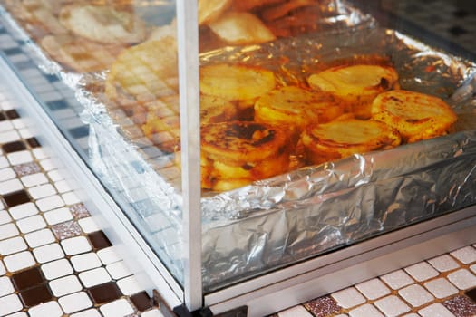 Close-up of arepa rellena food in a display cabinet, Luquillo, Puerto Rico