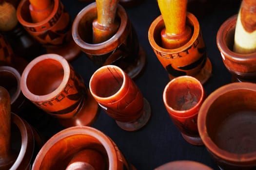 High angle view of mortars and pestles